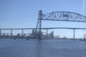 Look to the bottom left and you can see where the tracks start.  The bridge itself moves up and down.